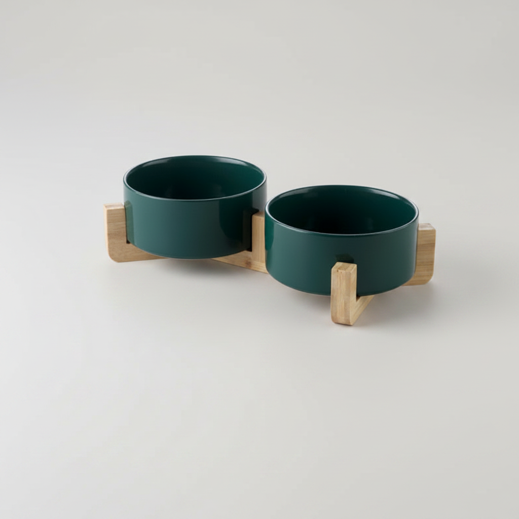 Forest green ceramic double dog bowl set on natural bamboo stand