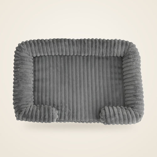 Ribbed plush calming bolster dog bed in charcoal gray